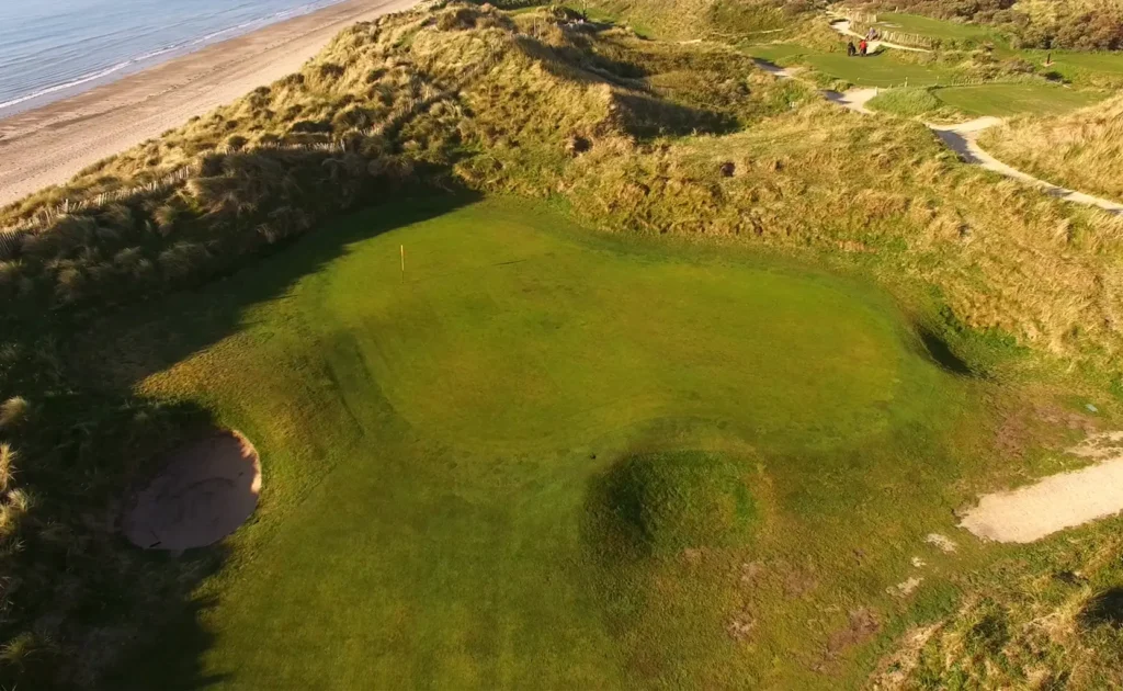 Aerial view of green and hole